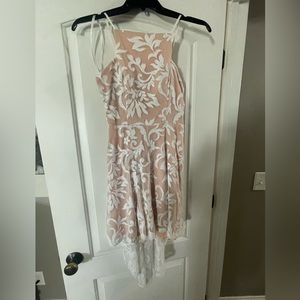 NWT.  White/tan sequin party dress.  Short in front/ longer train in back.